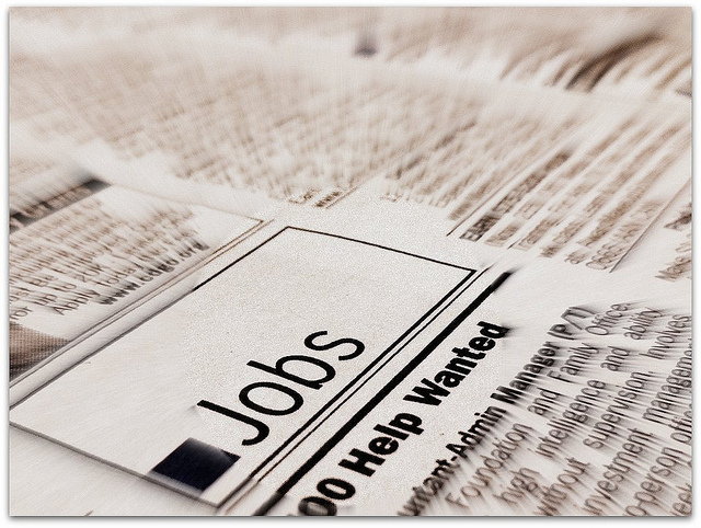 Image of help wanted jobs advertisement in newspaper.