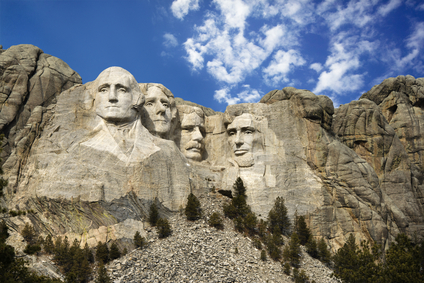 Image of President's Washington, Lincoln, Jefferson, Roosevelt carved into Mount Rushmore.