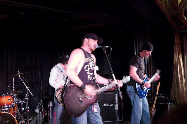 Image of Brantley Gilbert playing in concert.